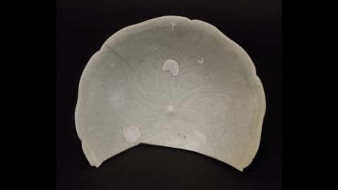 This is a Chinese ceramic bowl with qingbai glaze from the Java Sea Shipwreck. A similar piece, dated to the 10th through 12th centuries, has been found at an archaeological site in Sarawak, Malaysia.