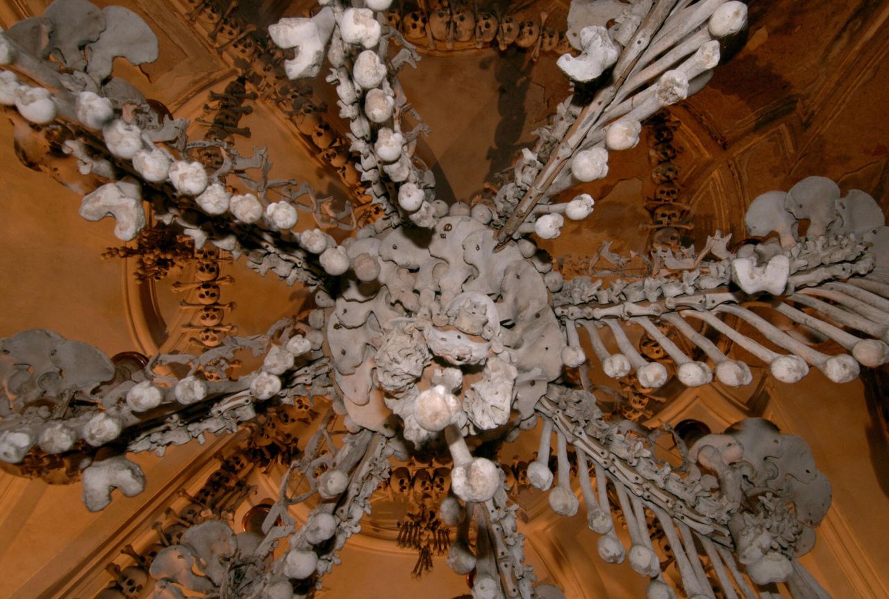 <strong>Sedlec Ossuary -- Czech Republic</strong>: A Baroque period bone-chandelier is just one of the skeletal oddities on display at the Sedlec Ossuary, a Chapel beneath the Cemetery Church of All Saints in Sedlec in the Czech Republic. It's decorated with 40,000 human remains from the 18th century.