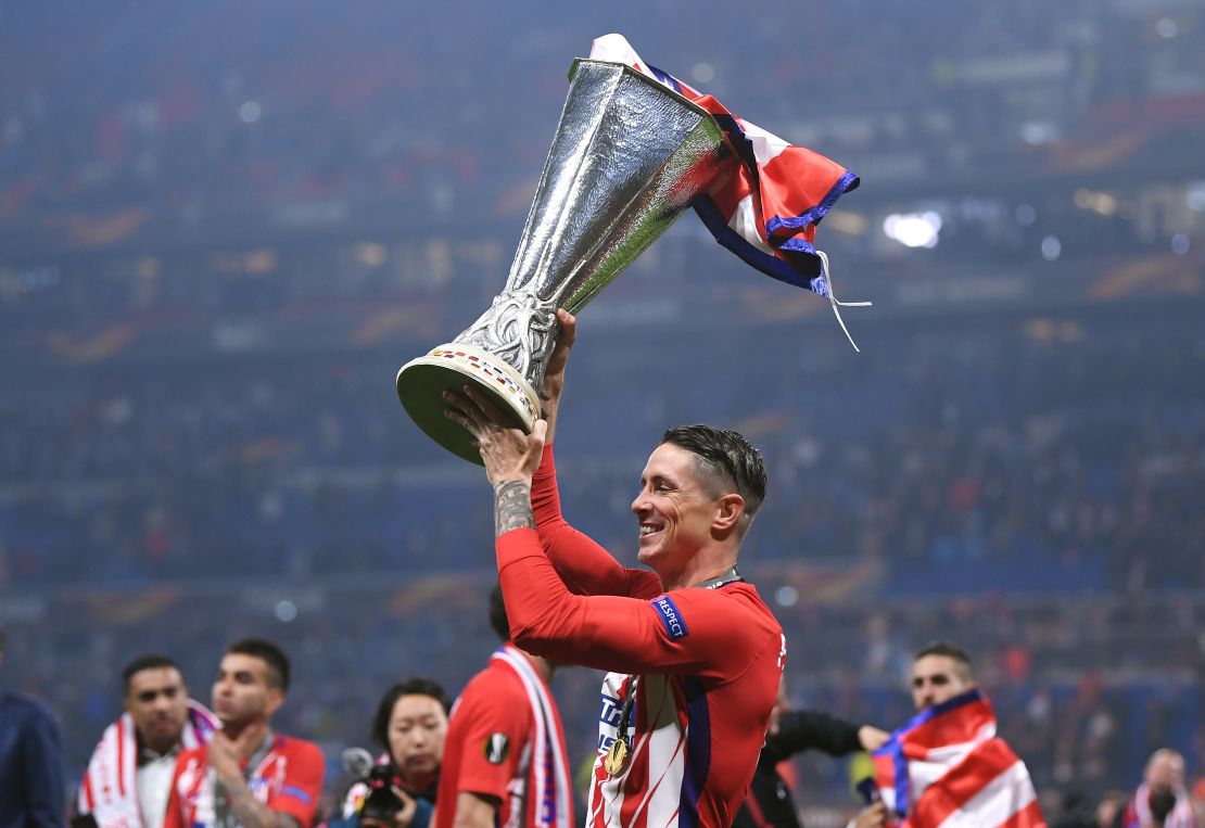 Fernando Torres celebrates his first major trophy for Atletico.