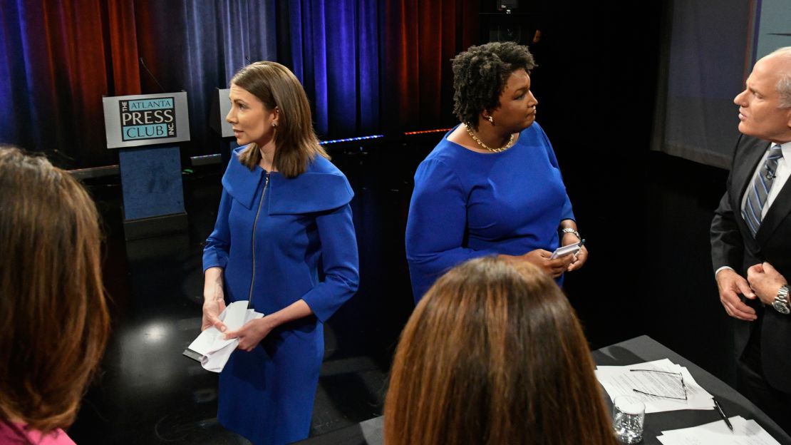They both grew up poor and are running as Democrats, but Stacey Evans, left, and Stacey Abrams are emphasizing how different they are. 
