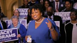 FILE - In this Tuesday, March 6, 2018 file photo, Stacey Abrams holds a news conference in Atlanta to announce she has qualified to run for governor. The record number of women expected to run for office in 2018 are already breaking barriers, upending traditional campaigning as they look to introduce themselves to an electorate they hope is eager for change. (Bob Andres/Atlanta Journal-Constitution via AP)