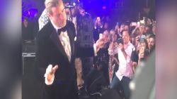 John Travolta was filmed dancing with 50 Cent at the Cannes Film Festival.
