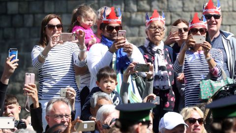 Royal fans line the streets of Windsor during the military dress rehearsal Thursday.
