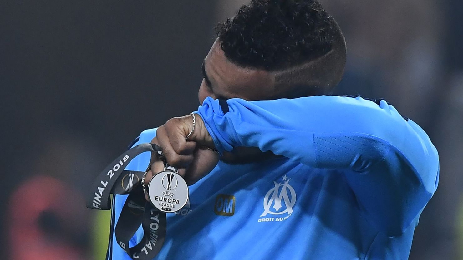 Dimtri Payet cries after Marseille's 3-0 Europa League final defeat to Atletico Madrid.