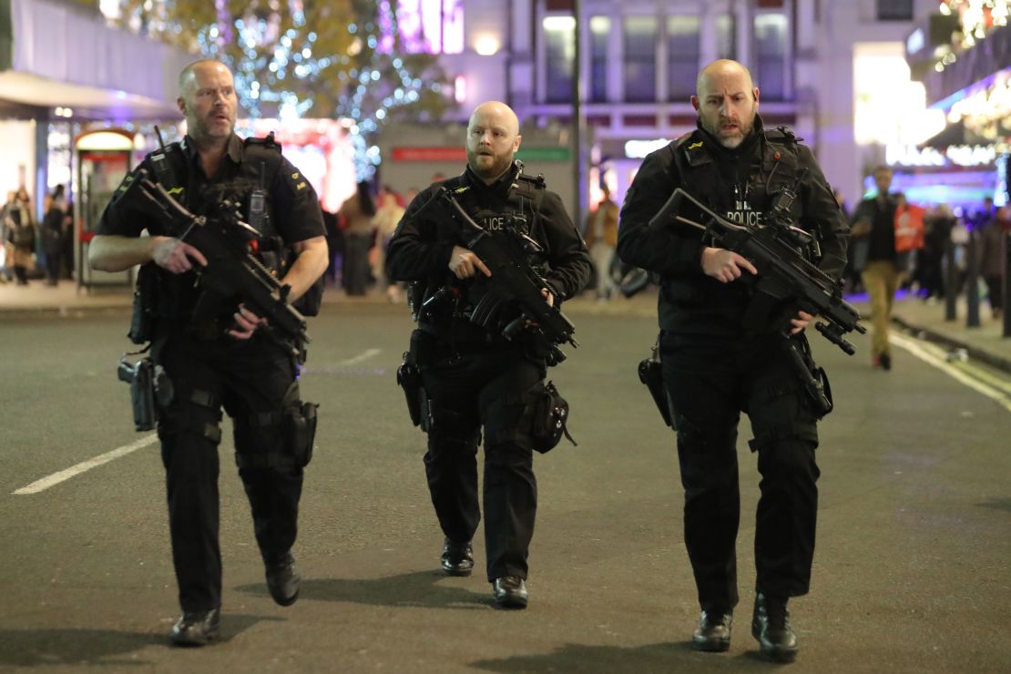 Armed police patrol near Oxford Street in central London in November.
