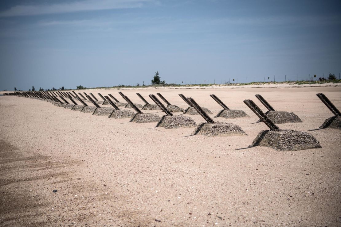Aged anti-landing barricades are positioned on a beach facing China on the Taiwanese island of Kinmen which, at points lies only a few miles from China.