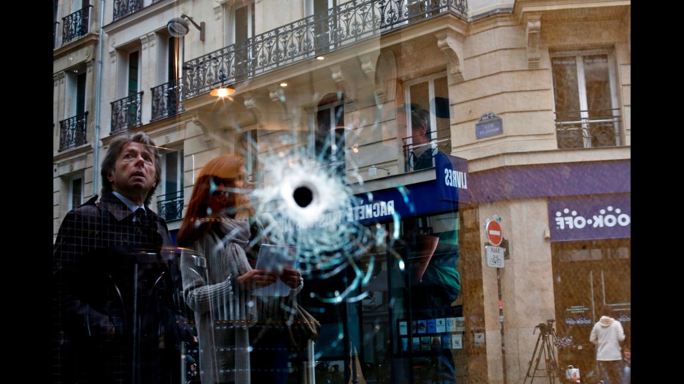 A bullet hole is seen on a cafe window in Paris on Sunday, May 13. The cafe was near the area where a knife-wielding attacker <a href="https://www.cnn.com/2018/05/13/europe/paris-stabbing-chechnya-attacker-intl/index.html" target="_blank">stabbed five people,</a> killing one of them, before being fatally shot by police. ISIS claimed responsibility for the attack.