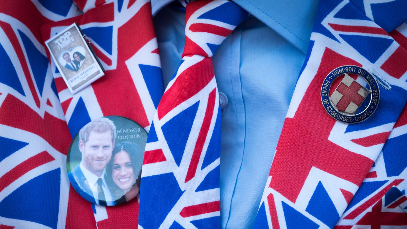 Britain's Prince Harry and his fiancee, Meghan Markle, are seen on a person's clothes in Windsor, England, on Thursday, May 17. People are already camping out in Windsor so they can catch a glimpse of the couple on <a href="https://www.cnn.com/2018/04/04/europe/royal-wedding-what-we-know-intl/index.html" target="_blank">their wedding day.</a>