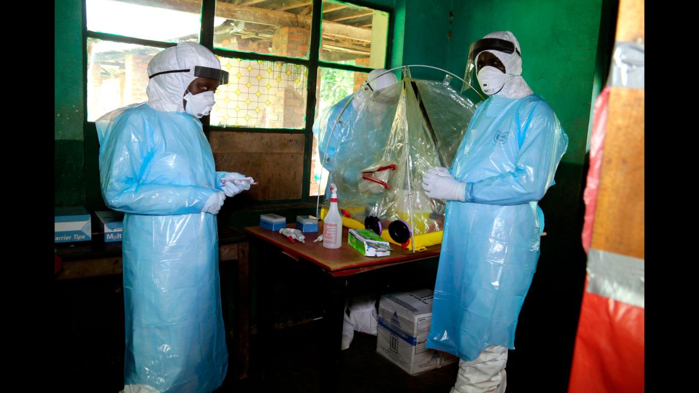 Health care workers wear protective gear at a treatment center in Bikoro, Congo, on Sunday, May 13. An Ebola outbreak was announced in the rural area last week, <a href="https://www.cnn.com/2018/05/17/health/ebola-outbreak-mbandaka-drc-intl/index.html" target="_blank">but it has since spread to Mbandaka,</a> a city of nearly 1.2 million people.