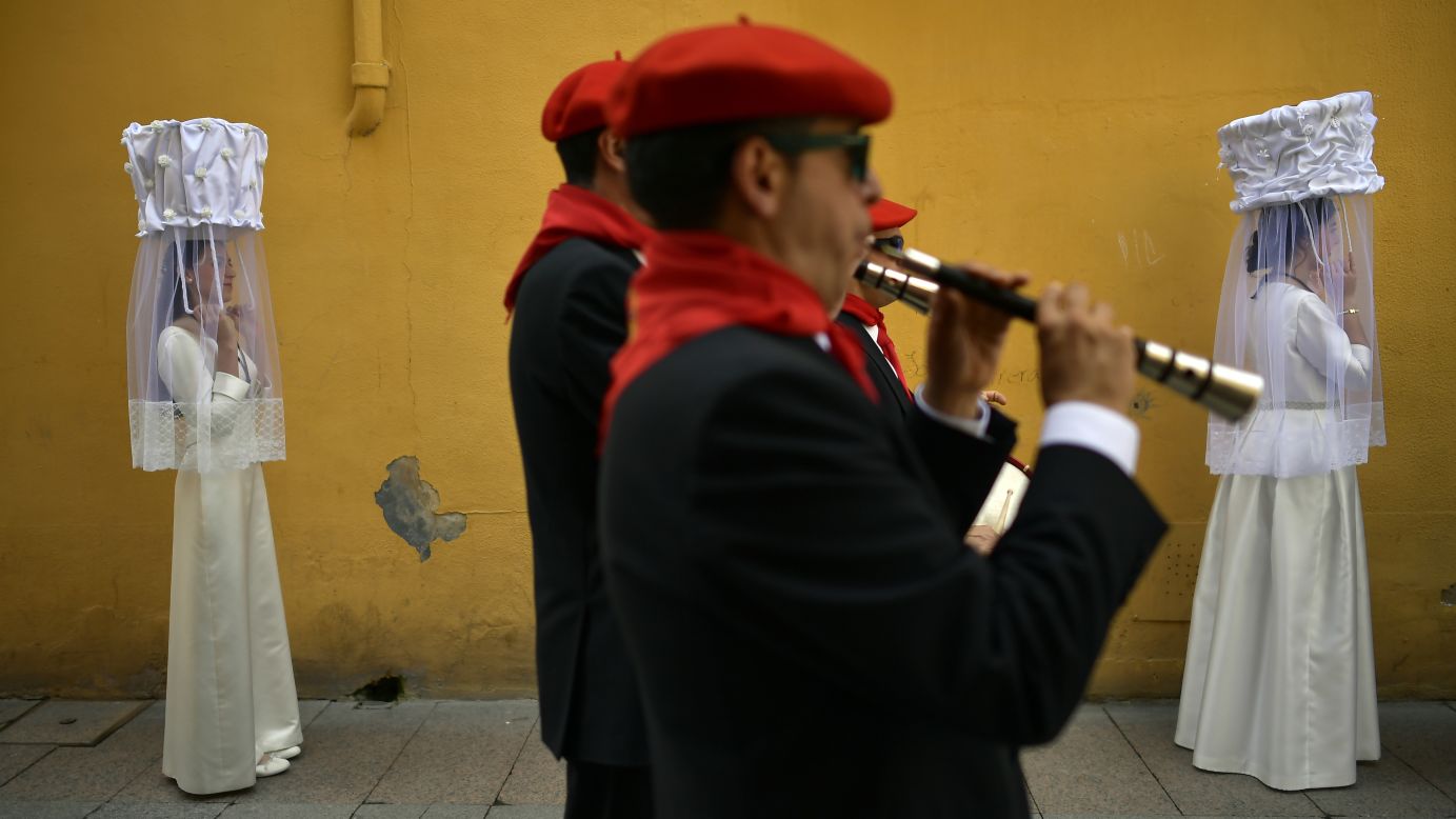 People take part of the Bread Procession of the Saint, a ceremony in Santo Domingo de la Calzada, Spain, on Friday, May 11. The annual ceremony honors St. Dominic of the Causeway, who the town is also named for. 