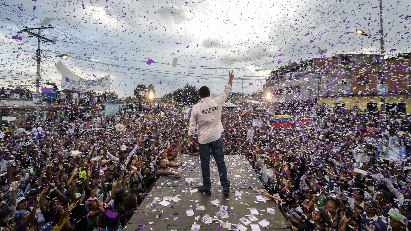 Presidential candidate Javier Bertucci waves to supporters during a campaign rally in Valencia, Venezuela, on Wednesday, May 16. <a href="https://www.cnn.com/2018/05/16/americas/venezuela-election-sunday/index.html" target="_blank">Venezuelans will head to the polls Sunday</a> to elect a president. The incumbent, Nicolas Maduro, assumed office when Hugo Chavez died in 2013.