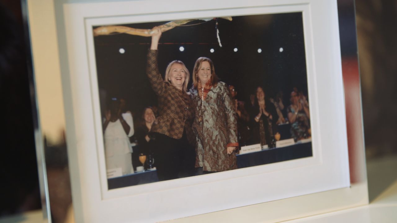 A photograph displayed in Disney's New York City office shows her with 2016 presidential candidate Hillary Clinton.