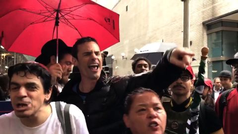A screenshot of Aaron Schlossberg yelling during a protest in New York City on May 25, 2017.
