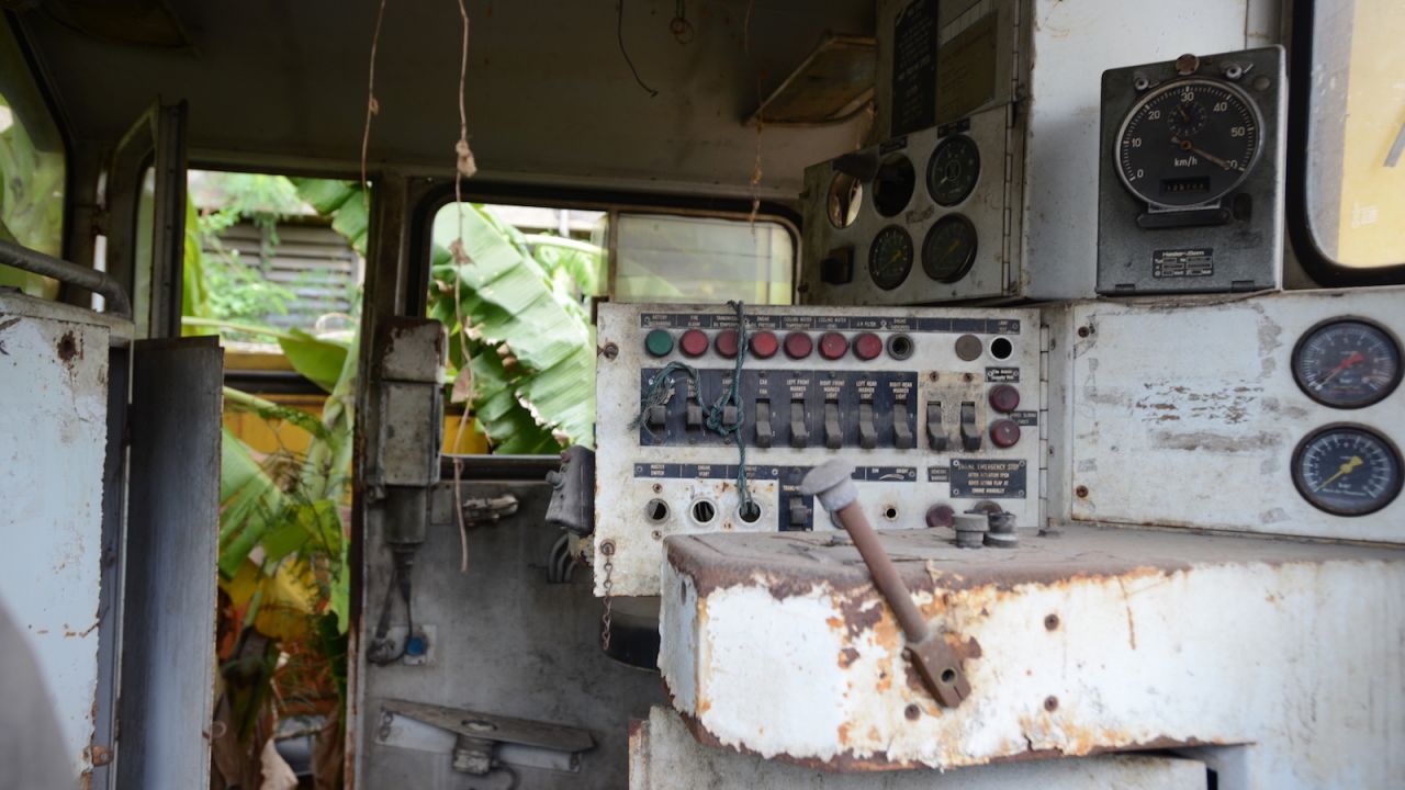 <strong>Control center:</strong> The control center of an old engine sits just outside the cavernous building where other trains are being refurbished.