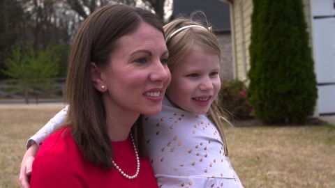 Stacey Evans, pictured with her daughter, says she can win support from moderates and disillusioned Republicans.