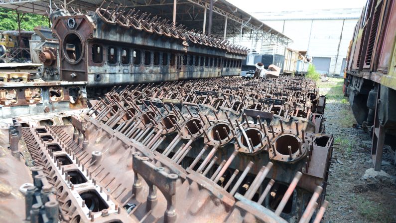 <strong>Train engines: </strong>Engine blocks are lined and stacked up outside the Makkasan repair buildings. 