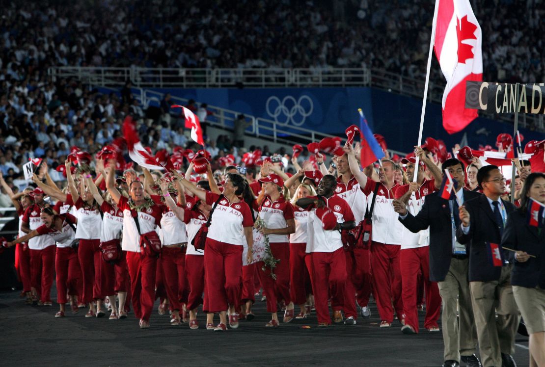 Flagbearer Nicolas Gill leads out the Canadian contingent at the Athens 2004 Olympic Opening Ceremony.