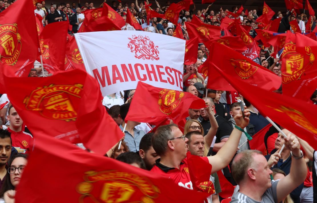 Manchester United fans cheer their team in the FA Cup semifinal.