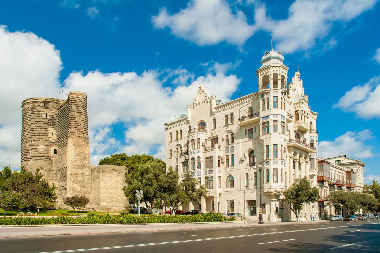 <strong>Stone and status:</strong> After landowner Isa Bey Hajinski became a major public figure he built an extravagant stately mansion right next to the Maiden Tower, Baku's most famous landmark (pictured left). "His house was a reflection of his status," says Akhundov.