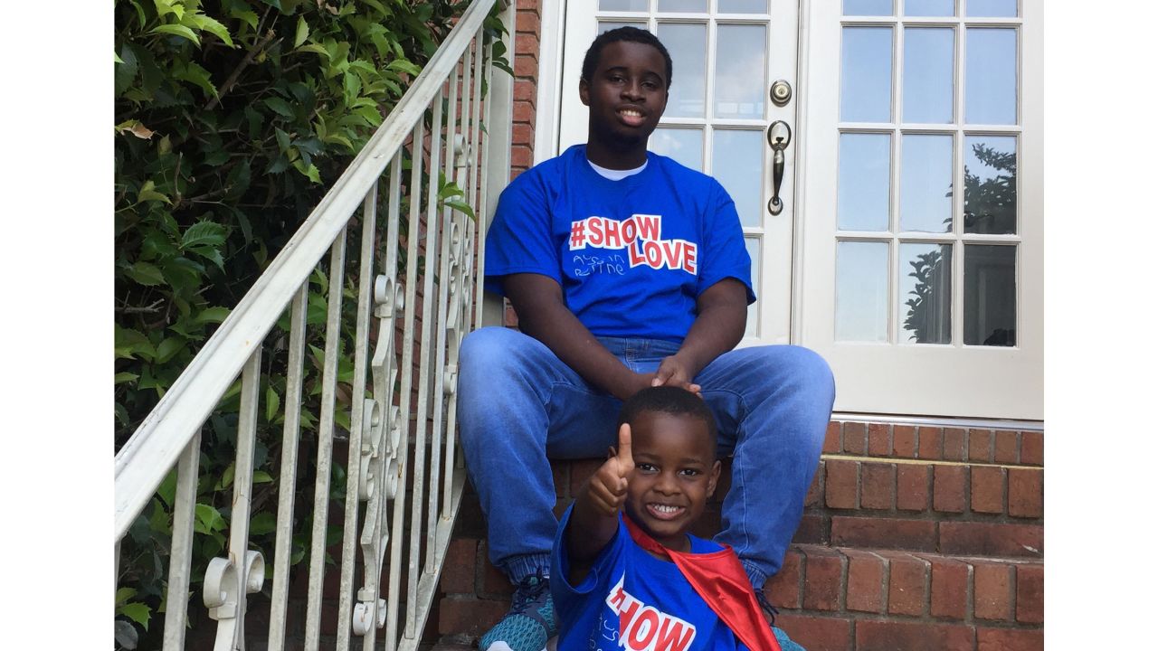 Austine Perine with his brother Taylor, age 16, who suffers from autism.