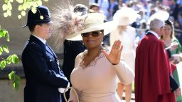 Oprah Winfrey waves as she arrives at St George's Chapel at Windsor Castle the wedding ceremony of Prince Harry and Meghan Markle at St. George's Chapel in Windsor Castle in Windsor, near London, England, on Saturday. (Ian West/pool photo via AP)