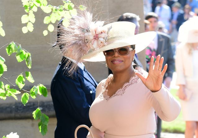 US presenter Oprah Winfrey wore a 70s inspired wide-brimmed hat by Philip Treacy. Dressed in dusty pink and cream -- Winfrey takes on all the colors associated with spring-time weddings. It was embellished with a large floral arrangement.