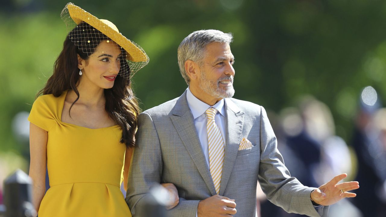 Amal Clooney and George Clooney arrived looking like they go to royal weddings every week.