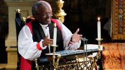 Bishop Michael Bruce Curry gives a reading during the wedding ceremony of Britain's Prince Harry, Duke of Sussex and US actress Meghan Markle in St George's Chapel, Windsor Castle, in Windsor, on Saturday. (Photo by Owen Humphreys / POOL / AFP)        (Photo credit should read OWEN HUMPHREYS/AFP/Getty Images)