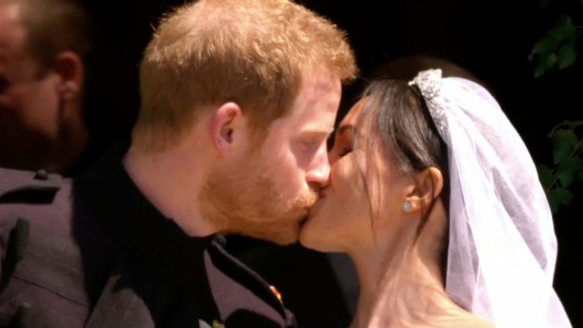 In this frame from video, Britain's Prince Harry and Meghan Markle kiss after their wedding ceremony at St. George's Chapel in Windsor Castle in Windsor, near London, England, Saturday, May 19, 2018.  (UK Pool via AP)