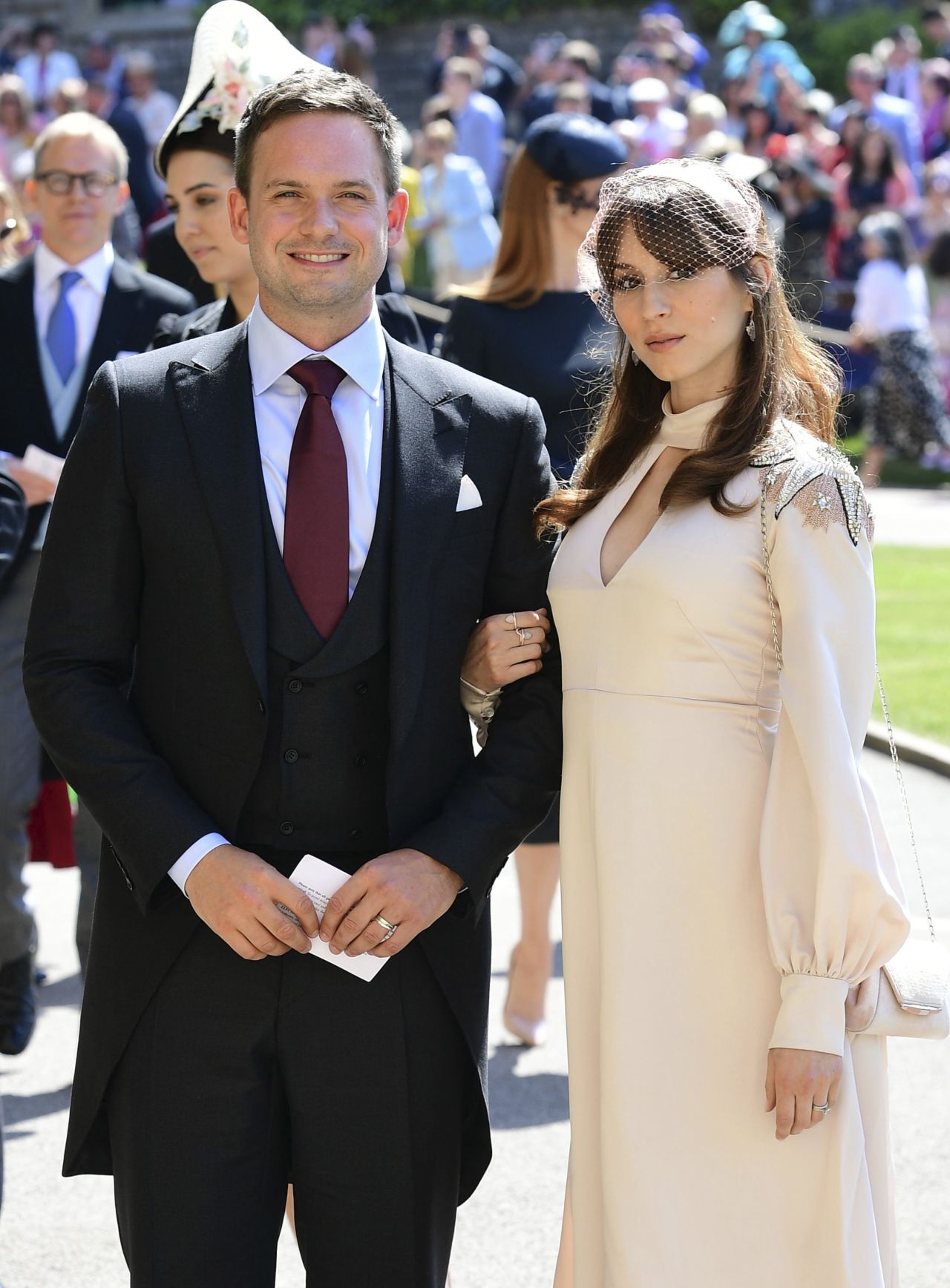 Patrick J. Adams and wife Troian Bellisario at the royal wedding in May 2018. 