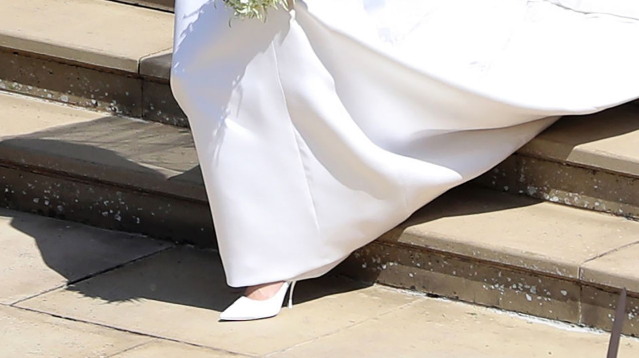 A detail of Meghan Markle's shoes, based on a Givenchy refined pointed couture design in silk duchess satin.