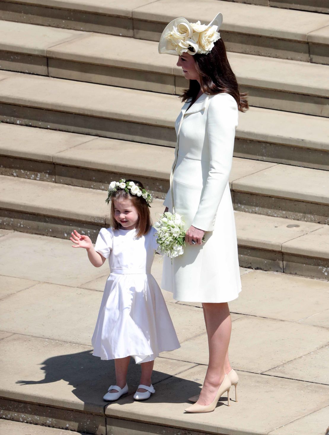 Princess Charlotte waves after the wedding.