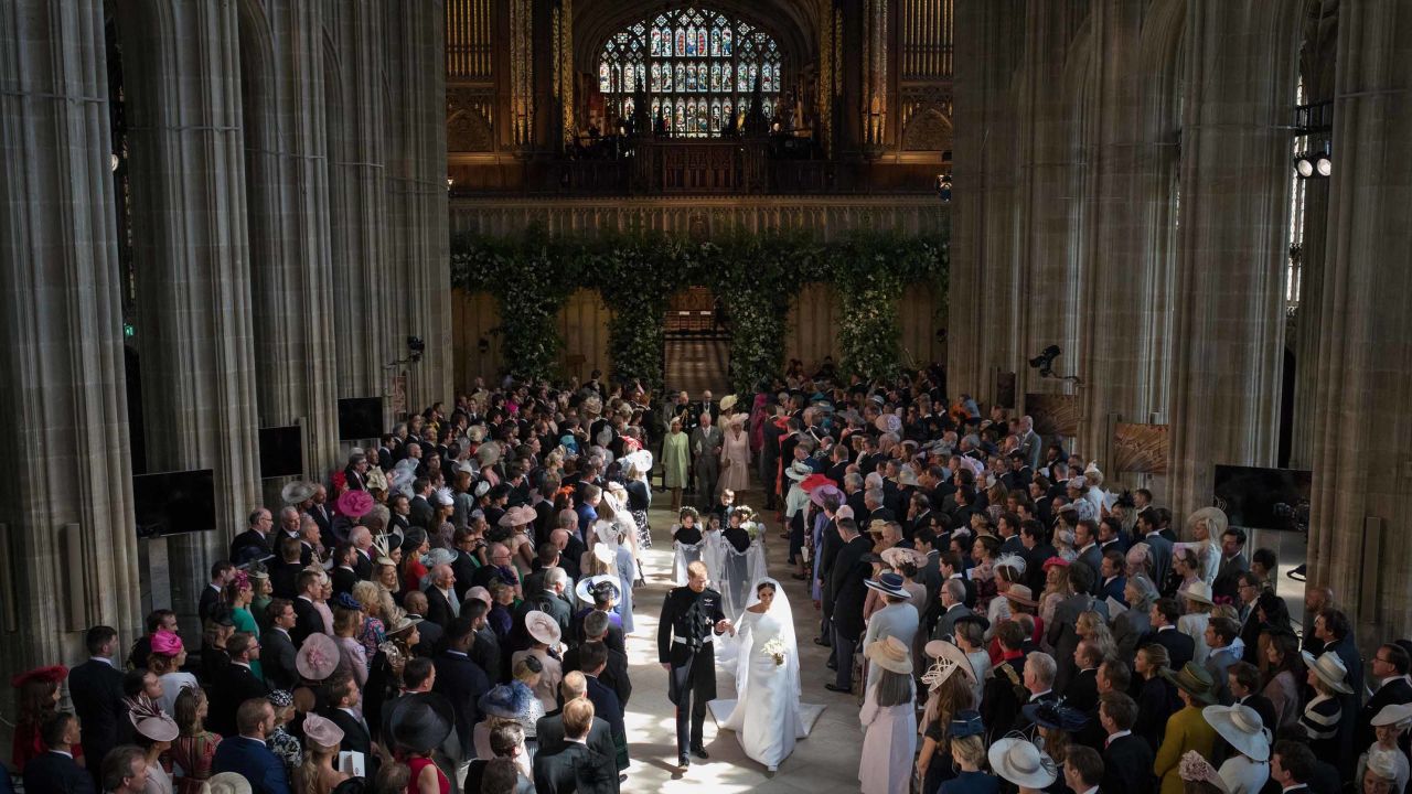 WINDSOR, UNITED KINGDOM - MAY 19:  Prince Harry and Meghan Markle leave St George's Chapel at Windsor Castle after their wedding on May 19, 2018 in Windsor, England. (Photo by Dominic Lipinski/WPA Pool/Getty Images)