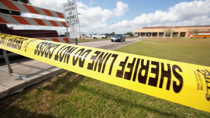 SANTA FE, TX - MAY 19: Crime scene tape surrounds Santa Fe High School on May 19, 2018 in Santa Fe, Texas. Yesterday morning, 17-year-old student Dimitrios Pagourtzis entered the school with a shotgun and a pistol and opened fire, killing 10 people.  (Photo by Scott Olson/Getty Images)