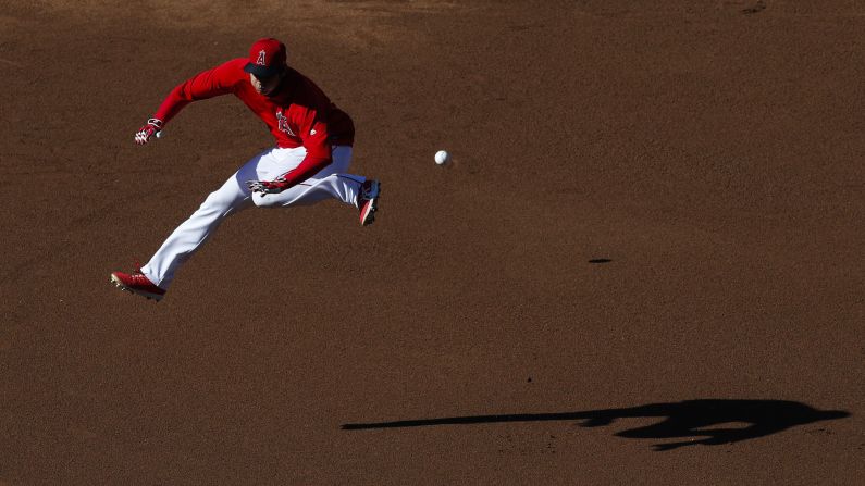 Los Angeles Angels' Shohei Ohtani, of Japan, dodges a ball while warming up for the team's baseball game against the Houston Astros on Tuesday, May 15, in Anaheim, California. 