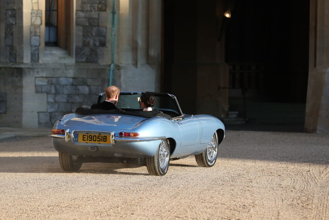 The number plate on the E-Type Jaguar the couple used to drive to their evening reception bore the date of the wedding.