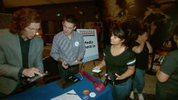 Organizers sign in young voters at an event in Santa Clarita, California.
