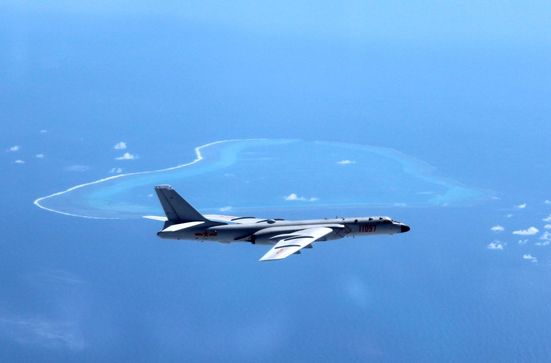 A July 2016 image shows a Chinese H-6K bomber patrolling islands and reefs in the South China Sea. 