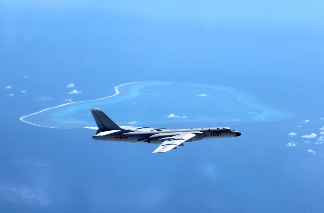 A July 2016 image shows a Chinese H-6K bomber patrolling islands and reefs in the South China Sea.