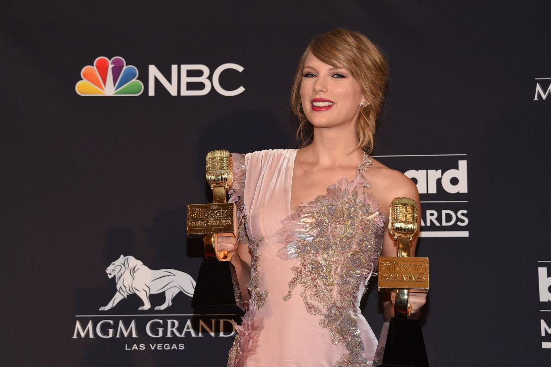 Taylor Swift poses in the the press room at the Billboard Music Awards 