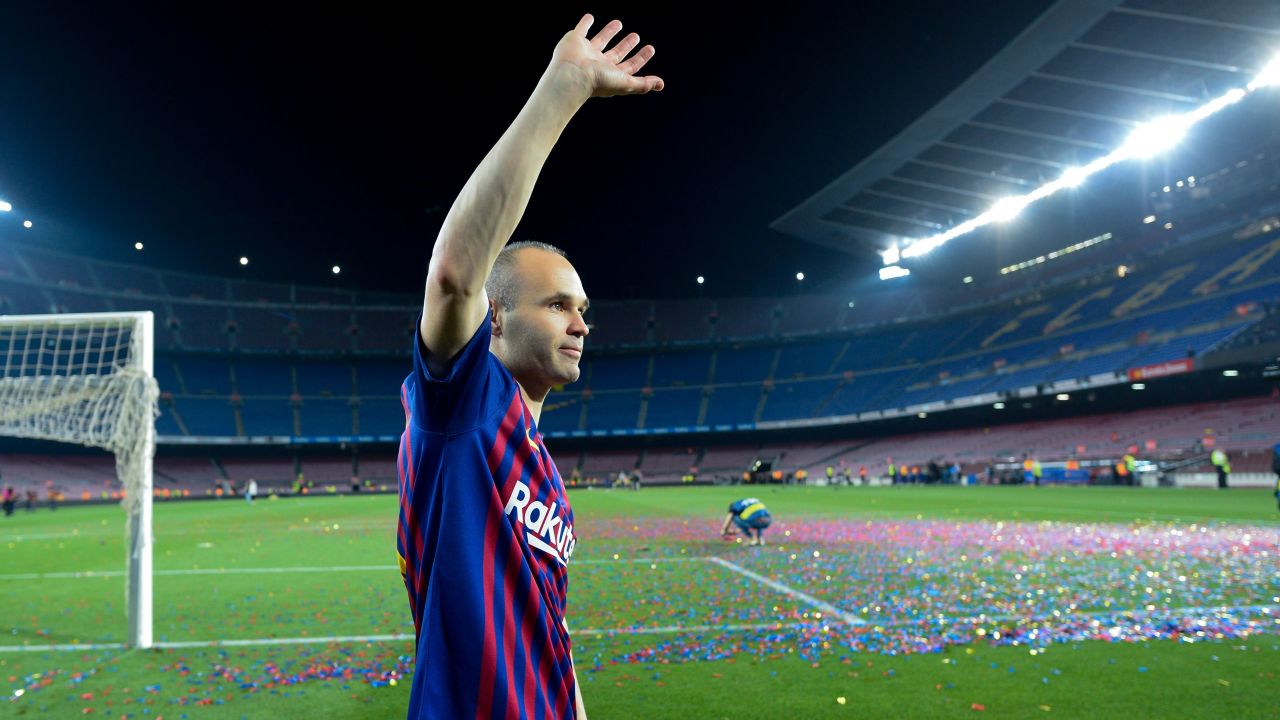 As the confetti settled and the Barcelona faithful returned home, Iniesta couldn't bring himself to leave