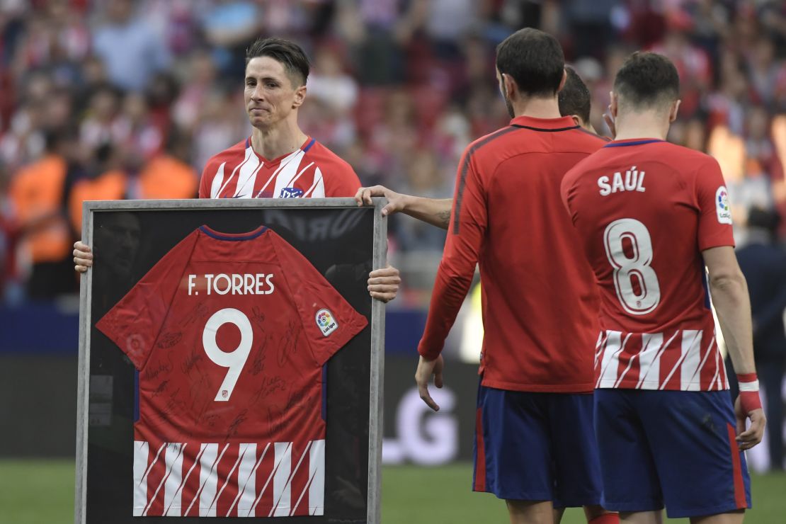 Torres was presented with a framed shirt signed by all his teammates and joined fans in a final rendition of the club's traditional anthem.