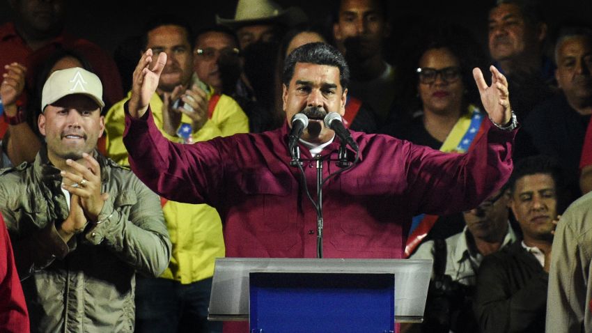 Venezuelan President Nicolas Maduro addresses supporters after the National Electoral Council (CNE) announced the results of the voting on election day in Venezuela, on May 20, 2018 in Caracas. - President Nicolas Maduro was declared winner of Venezuela's election Sunday in a poll rejected as invalid by his rivals, who called for fresh elections to be held later this year. With more than 90 percent of the votes counted, Maduro had 67.7 percent of the vote, with his main rival Henri Falcon taking 21.2 percent, the National Election Council chief Tibisay Lucena announced. (Photo by Federico PARRA / AFP)        (Photo credit should read FEDERICO PARRA/AFP/Getty Images)