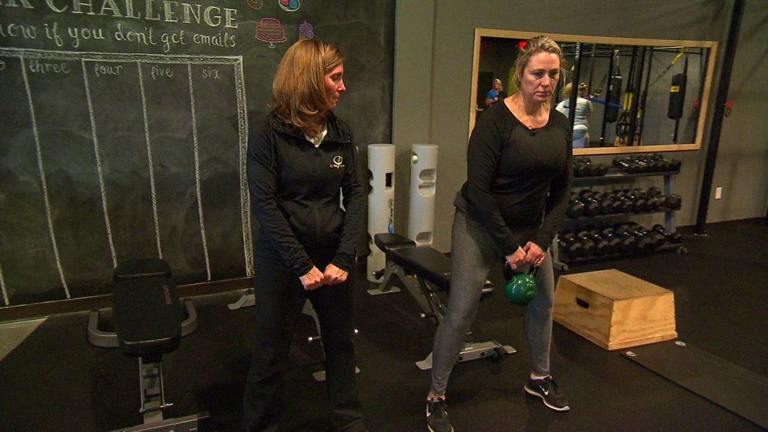 Mignerey learns how to properly lift a kettlebell in this low-impact functional fitness class. 