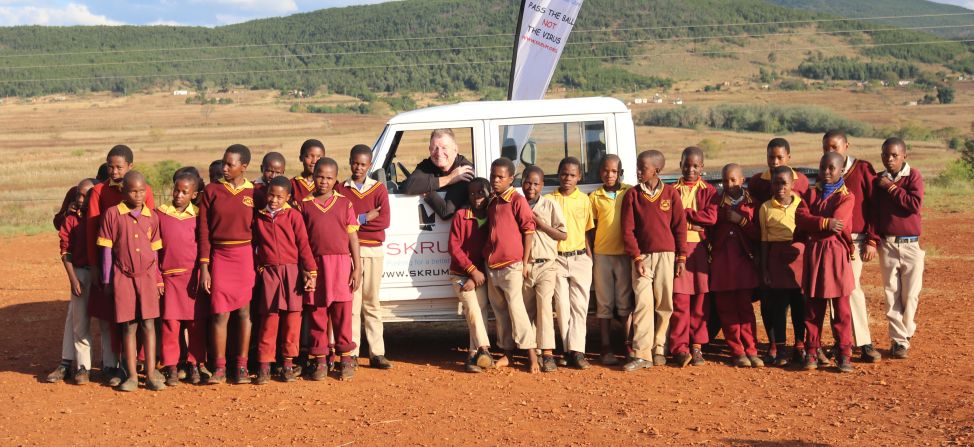 Michael Collinson (center) was paralyzed after a car accident with a bull in 2002. Five years later, after suffering for long periods from depression, he set up SKRUM in Swaziland, a charity that aims, through rugby, to educate children about HIV and Aids.