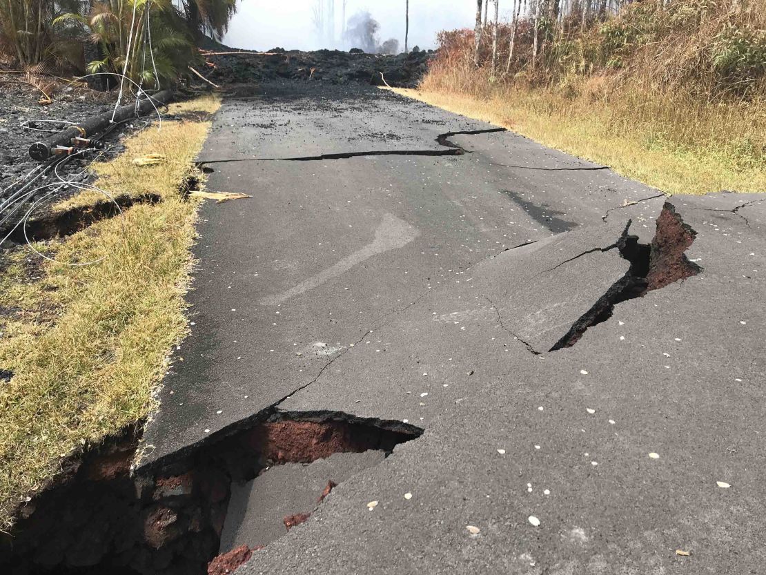 A road in Leilani Estates is now impassable as it is pitted with massive cracks in the pavement. 