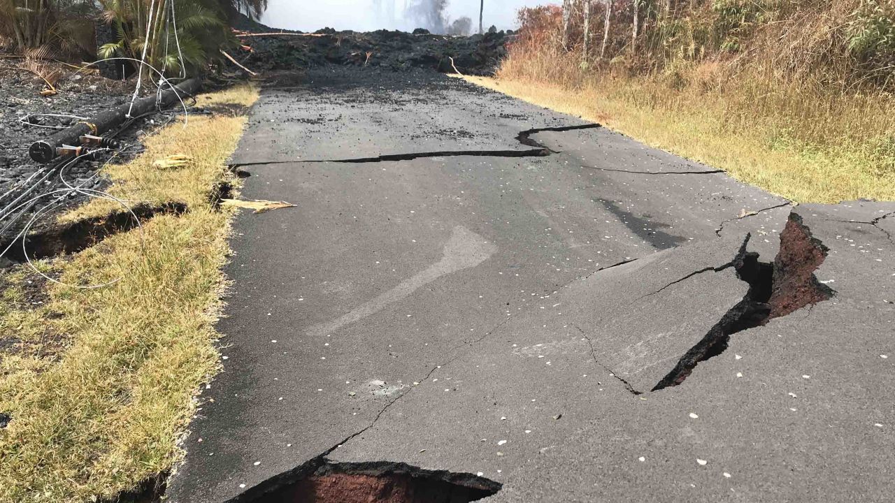 A road in Leilani Estates is now impassable as it is pitted with massive cracks in the pavement. 