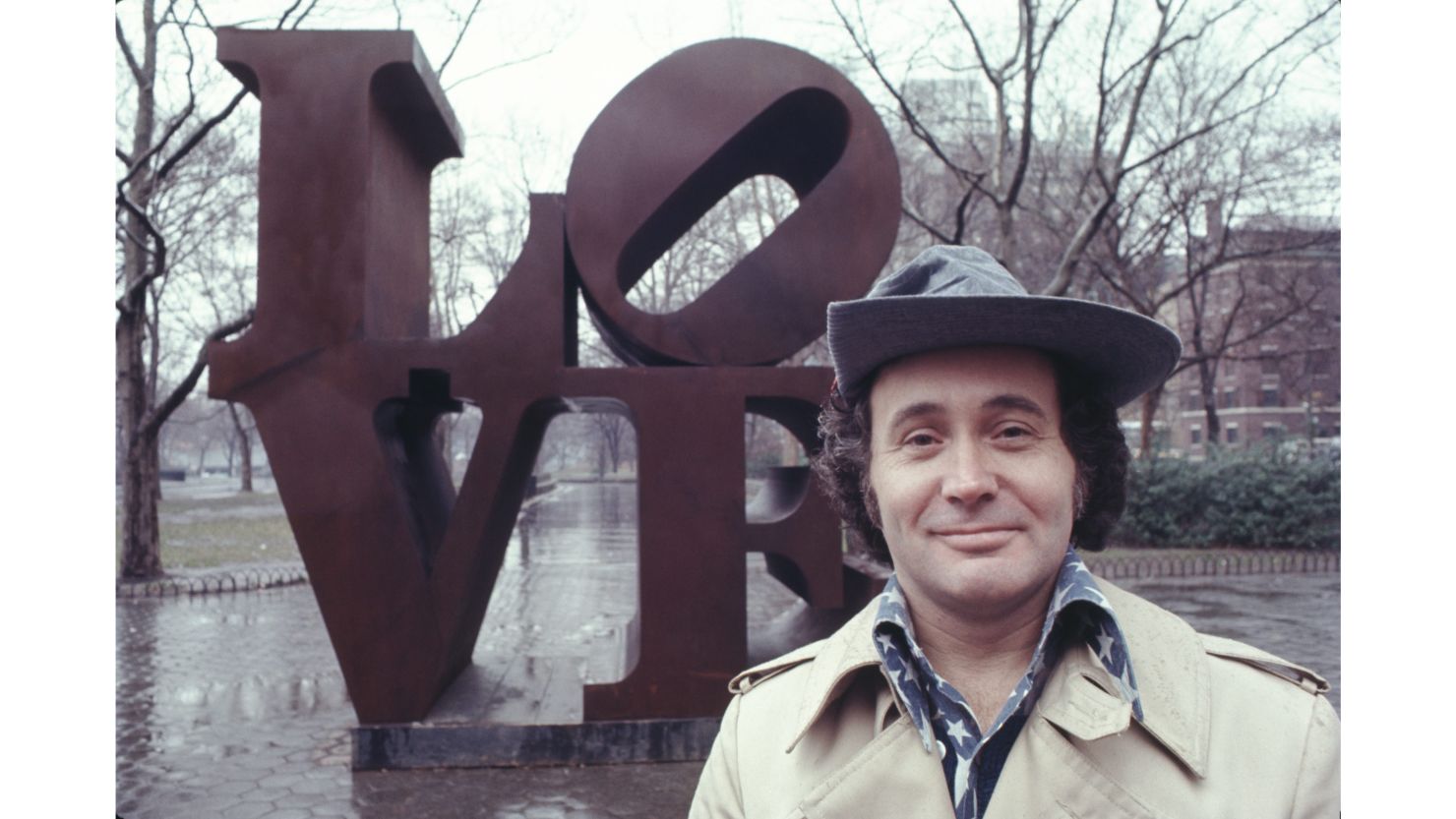 Robert Indiana with his 'LOVE' sculpture in Central Park, New York City in 1971