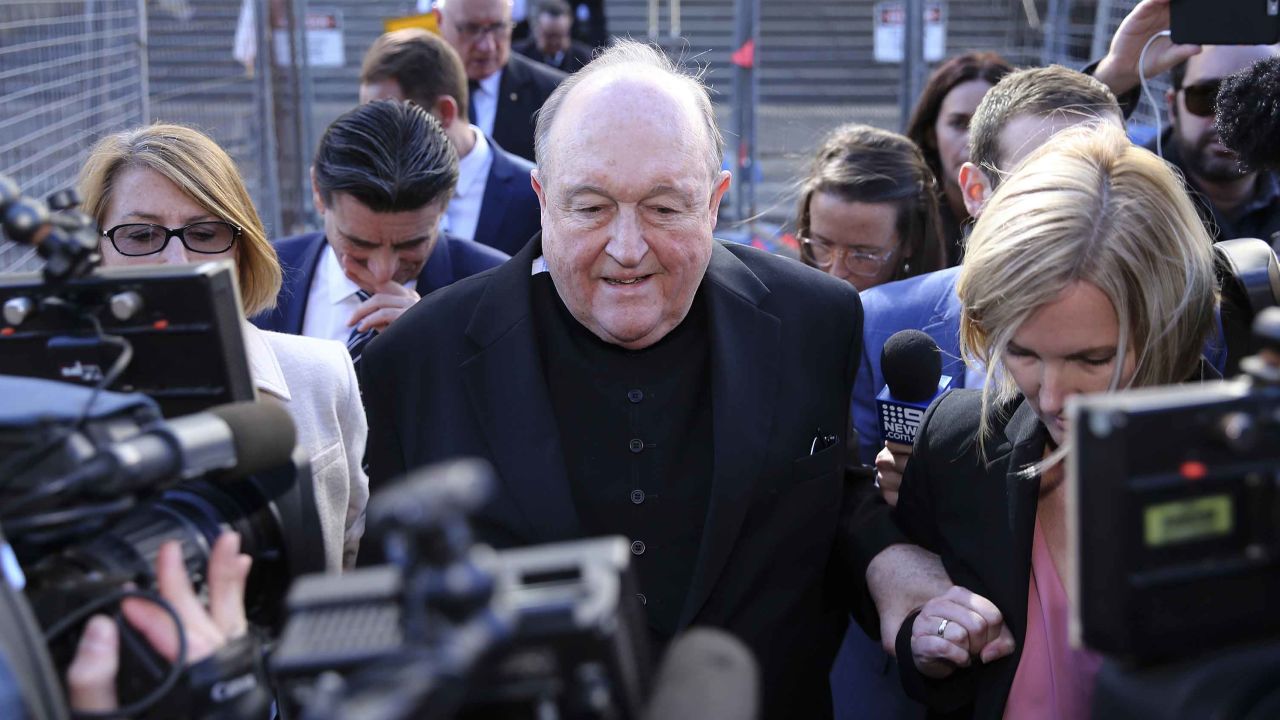 Archbishop Philip Wilson (center) leaves the Newcastle Local Court in Newcastle, New South Wales, Australia, on 22 May 2018.