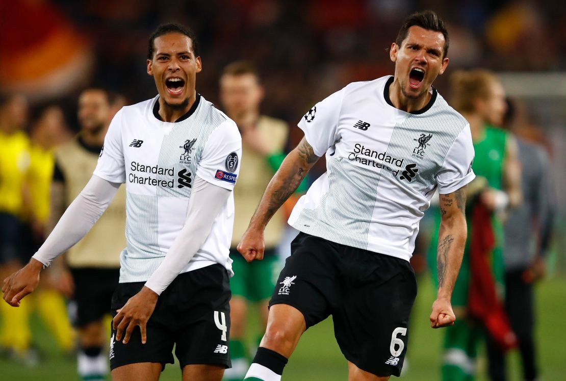 Van Djik (left) joined Liverpool for a record £75 million in January and has formed a solid partnership with Lovren.